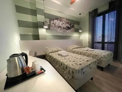 Letto o letti in una camera di Residence Corso Europa