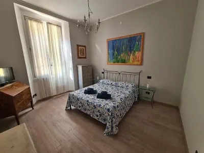 Letto o letti in una camera di Una Finestra su Rapallo by PortofinoVacanze
