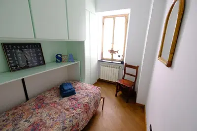 Letto o letti in una camera di Una Finestra su Rapallo by PortofinoVacanze