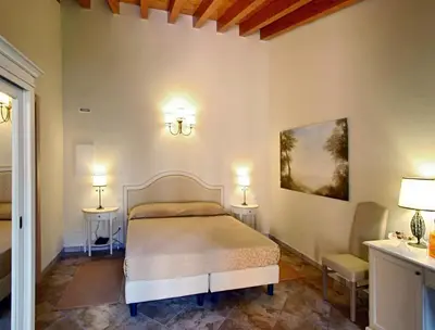 Letto o letti in una camera di Hotel Villa Borghesi