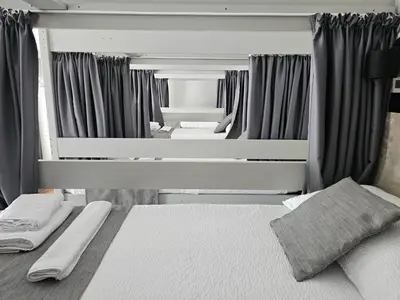 Letto o letti in una camera di The Host