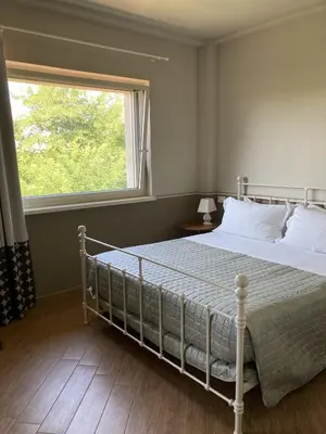 Letto o letti in una camera di La Corte Nascosta Volpedo