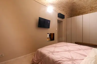 Letto o letti in una camera di Parma Centro House