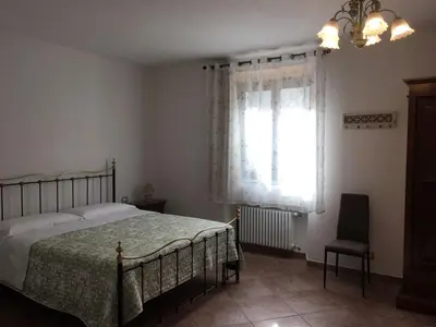 Letto o letti in una camera di Agriturismo Cà di Matt