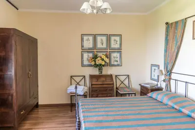 Letto o letti in una camera di Villa Ca de Angeli - Tabiano Castle Country Villas