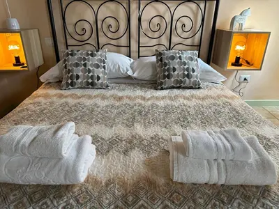 Letto o letti in una camera di Incanto