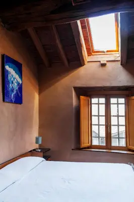 Letto o letti in una camera di Ostello Artemista Ass. Ostelli Lombardia