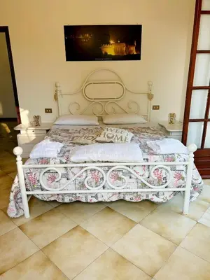 Letto o letti in una camera di La casa del Tiglio