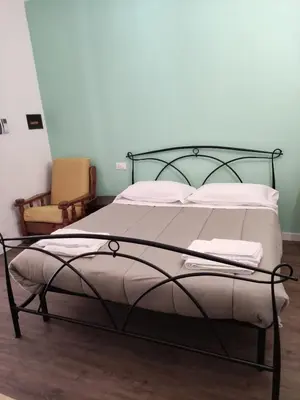 Letto o letti in una camera di Loggia Piani Nuovi