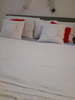Letto o letti in una camera di Appartamento luminoso Crema - parcheggio gratis