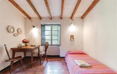 Letto o letti in una camera di Casa Lasetto