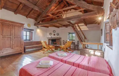 Letto o letti in una camera di Casa Il Fienile