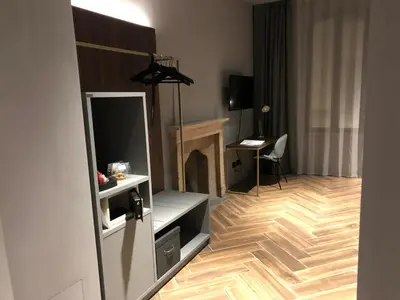 TV o dispositivi per l'intrattenimento presso Materiaprima camere-rooms