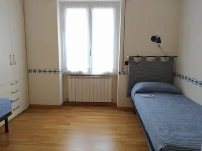 Letto o letti in una camera di Castelletto al mare