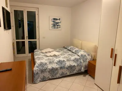 Letto o letti in una camera di Casa Edoardo
