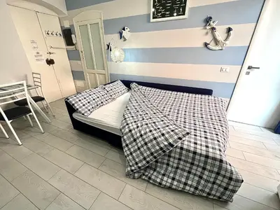 Letto o letti in una camera di Cà del Mar - La Spezia e Cinque Terre