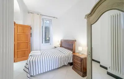 Letto o letti in una camera di Alloro