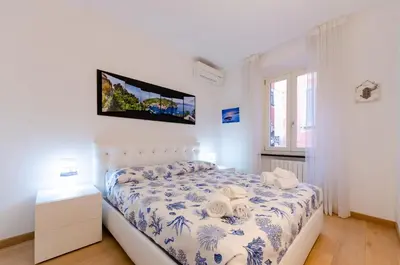 Letto o letti in una camera di Appartamento di design