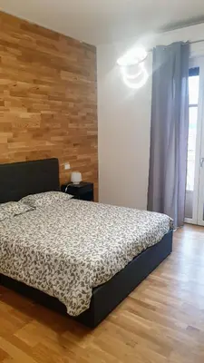 Letto o letti in una camera di Casa Caterina