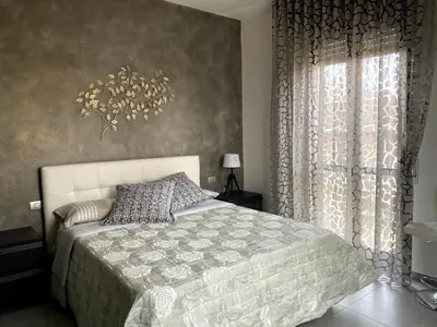 Letto o letti in una camera di La casa di Betty