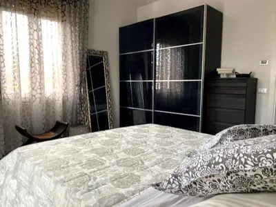 Letto o letti in una camera di La casa di Betty