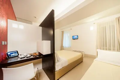 Letto o letti in una camera di Savoy Hotel