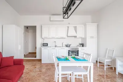 Cucina o angolo cottura di CITY CENTER - LUIGI&CAROLINA APARTMENTS - by Host4U