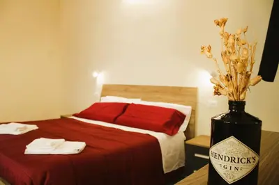 Letto o letti in una camera di Elegante Suite con giardino in centro storico