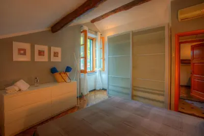 Letto o letti in una camera di Exclusive Holiday Home, La Casa dei pittori Monterosso