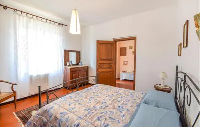 Letto o letti in una camera di Amazing Home In Santo Stefano Magra
