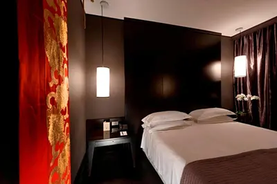 Letto o letti in una camera di Grand Hotel De La Ville