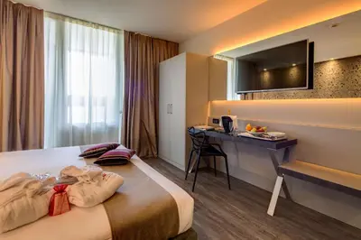 Letto o letti in una camera di Best Western Plus Hotel Farnese
