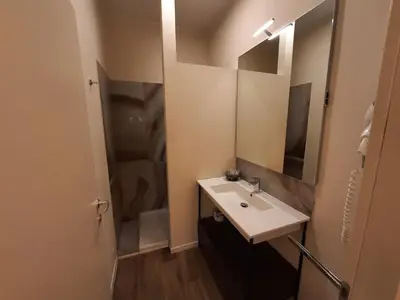 Bagno di STOP&GO Suites and Apartments