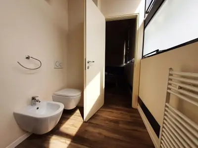 Bagno di STOP&GO Suites and Apartments