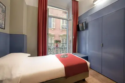 Letto o letti in una camera di Hotel Italia e Lido