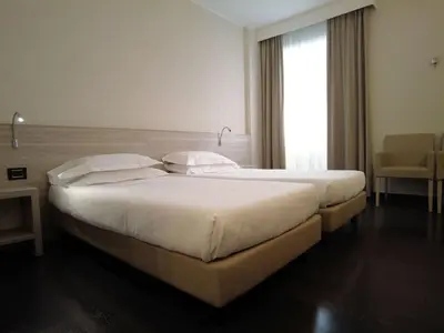 Letto o letti in una camera di Best Western Park Hotel