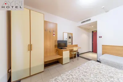 Letto o letti in una camera di Hotel Ayri