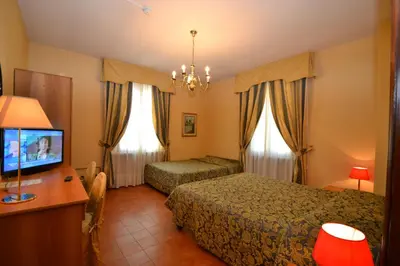 Letto o letti in una camera di Hotel Residence