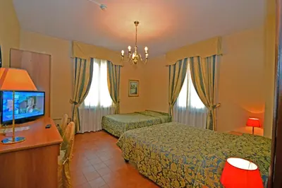 Letto o letti in una camera di Hotel Residence