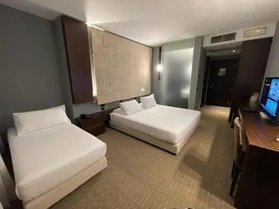 Letto o letti in una camera di Bes Hotel Cremona Soncino