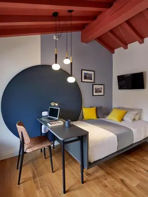 Letto o letti in una camera di Ca’ Prandini