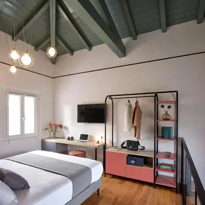 Letto o letti in una camera di Ca’ Prandini