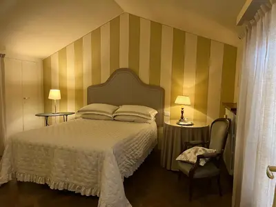 Letto o letti in una camera di B&B Artincentro