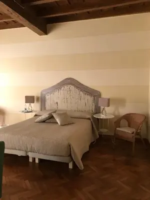 Letto o letti in una camera di B&B Artincentro