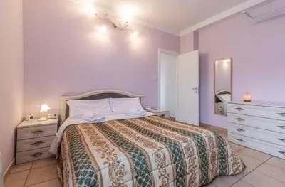 Letto o letti in una camera di Da Birba a Casinalbo Affitti Brevi Italia