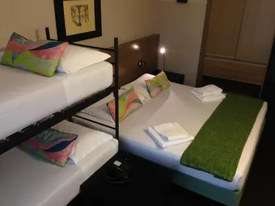 Letto o letti in una camera di Hotel Forum
