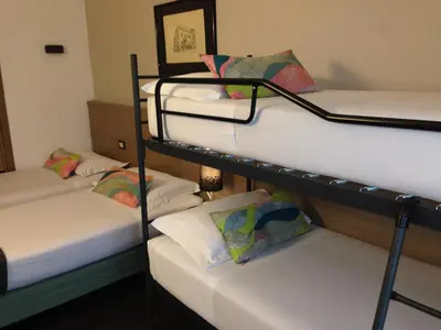 Letto o letti in una camera di Hotel Forum
