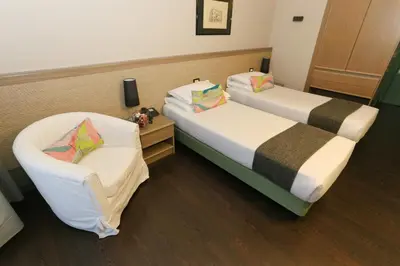 Letto o letti in una camera di Hotel Forum