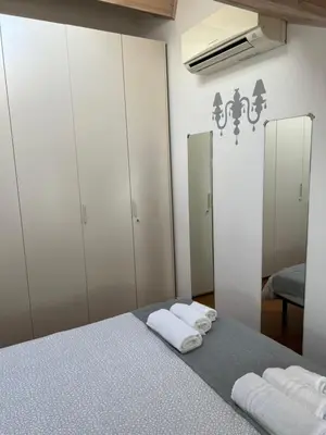 Letto o letti in una camera di La mansarda in centro