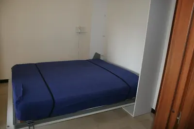 Letto o letti in una camera di Casa Paggi